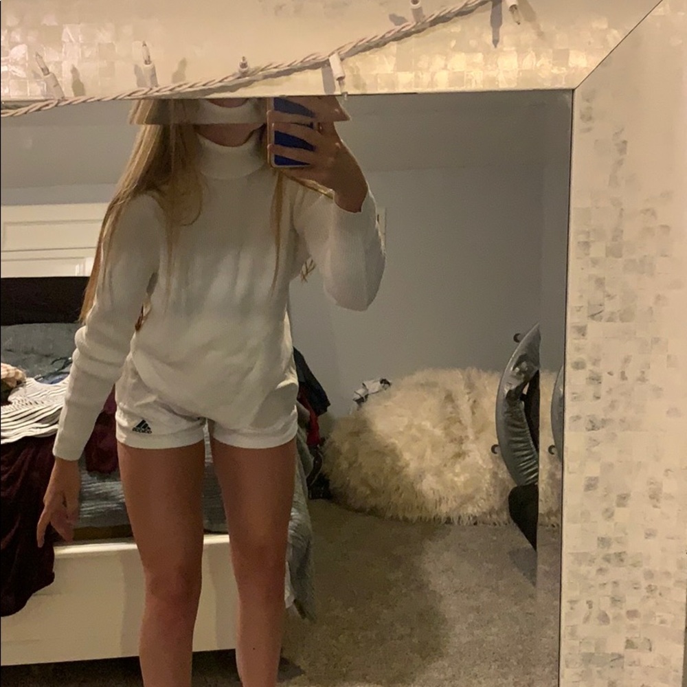 white turtle neck shirt